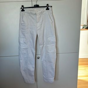 Mother carpenter jeans.  Heavy stretch denim.  Slightly barrel shape.